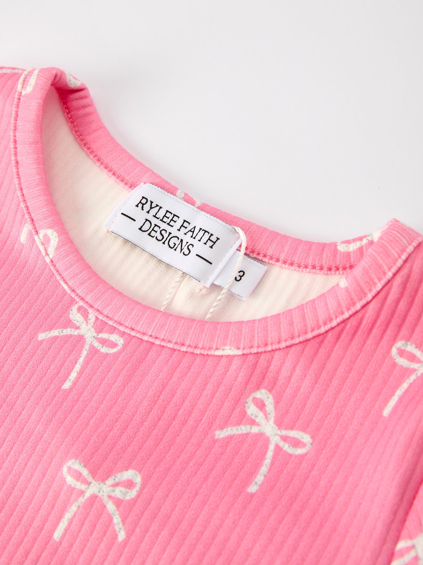 Christmas Girls Pink Bow Pajama Set: Comfy and Cute