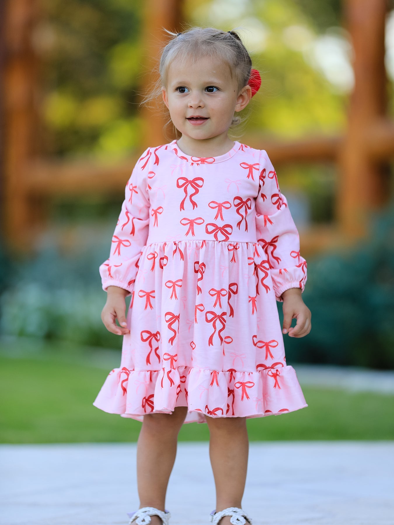 Pink Bow Print Girls Dress with Ruffle Hem