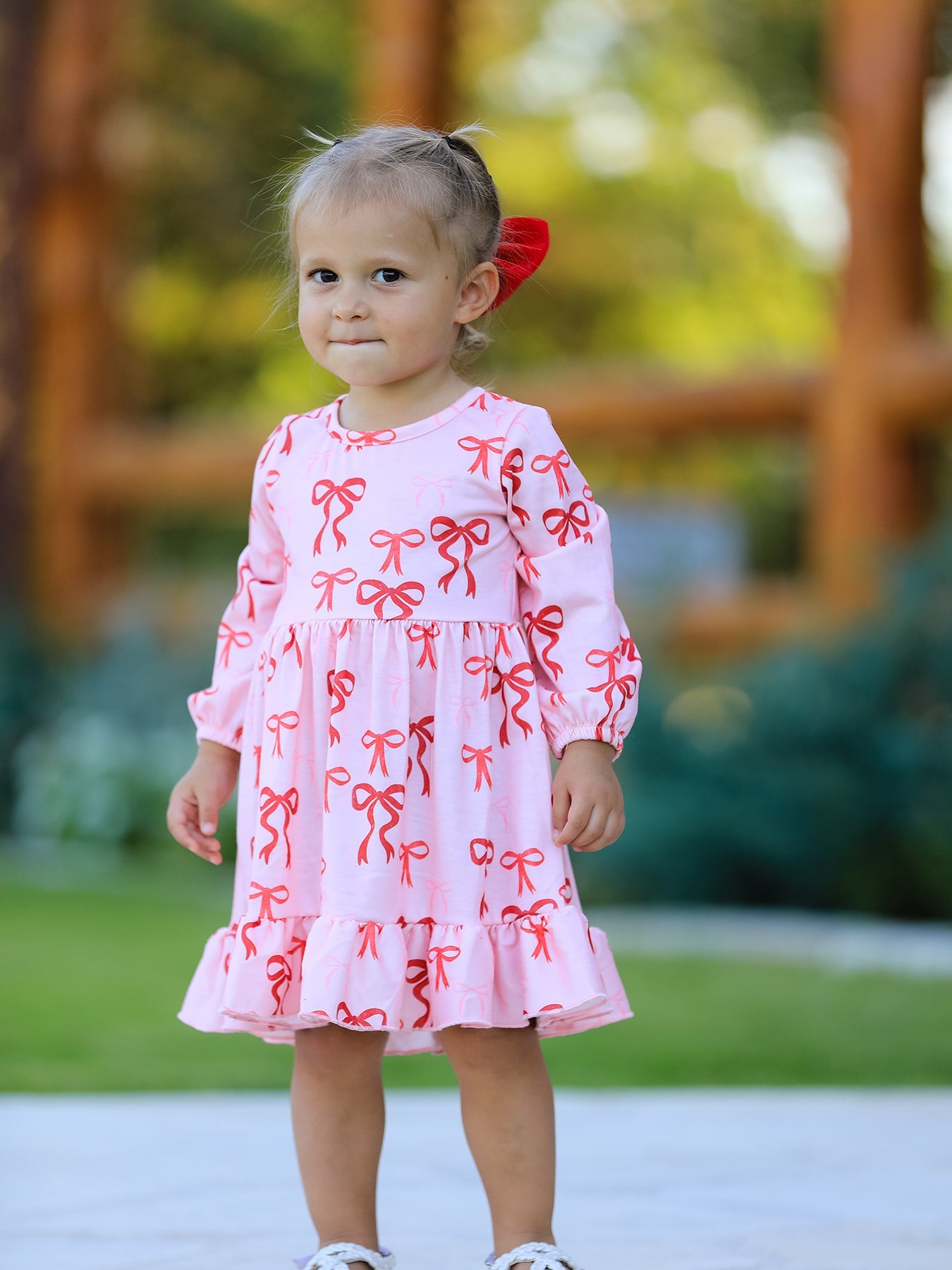 Pink Bow Print Girls Dress with Ruffle Hem